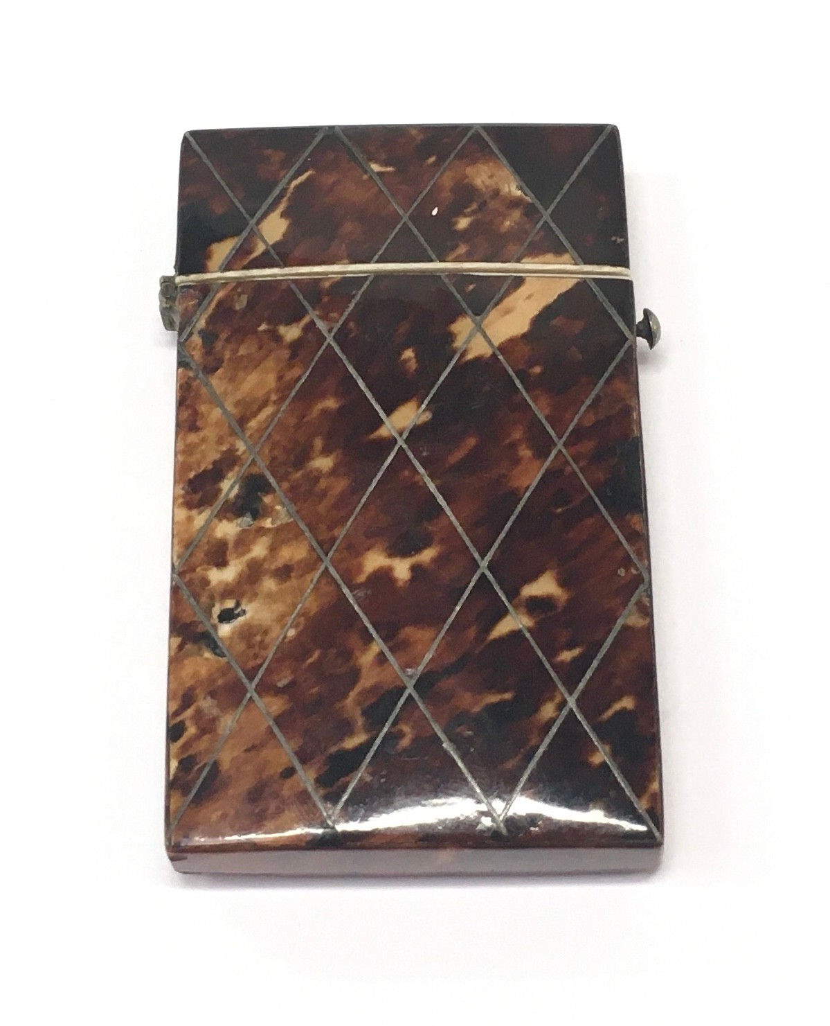 Tortoiseshell card case with white metal inlaid decoration.