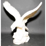 Large alabaster figure of an eagle signed A Giannelli 35cms tall with 35cms wingspan