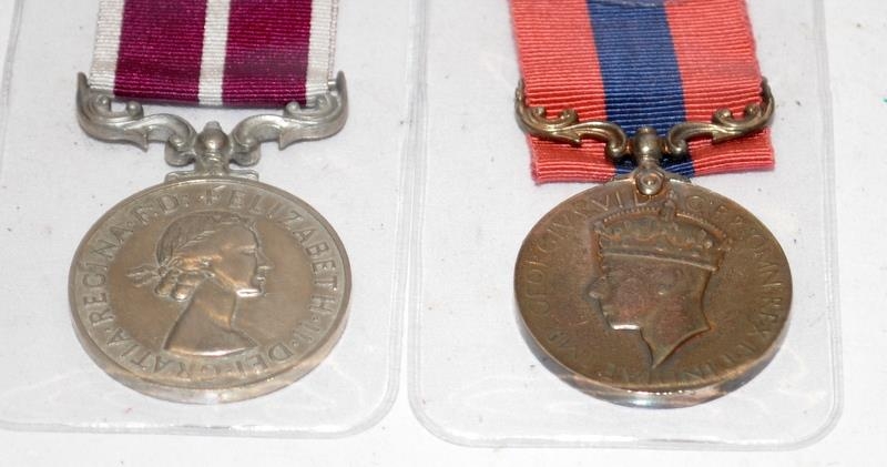 Collection of British military quality copy medals. Includes Air Force Cross, Royal Naval Victoria - Image 3 of 8