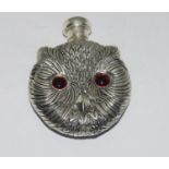 A large owl shaped perfume bottle set with glass eyes amd stamped 800
