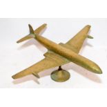 Vintage large solid brass model of a jet aircraft marked RAF to base. 36cms wingspan