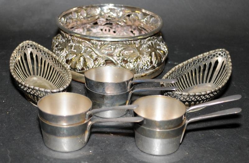 Collection of vintage silver plate to include pierced wine bottle coaster, two bon bon dishes and