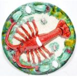 Large Majolica plate featuring a lobster. In good condition with no obvious losses or repairs. 30cms