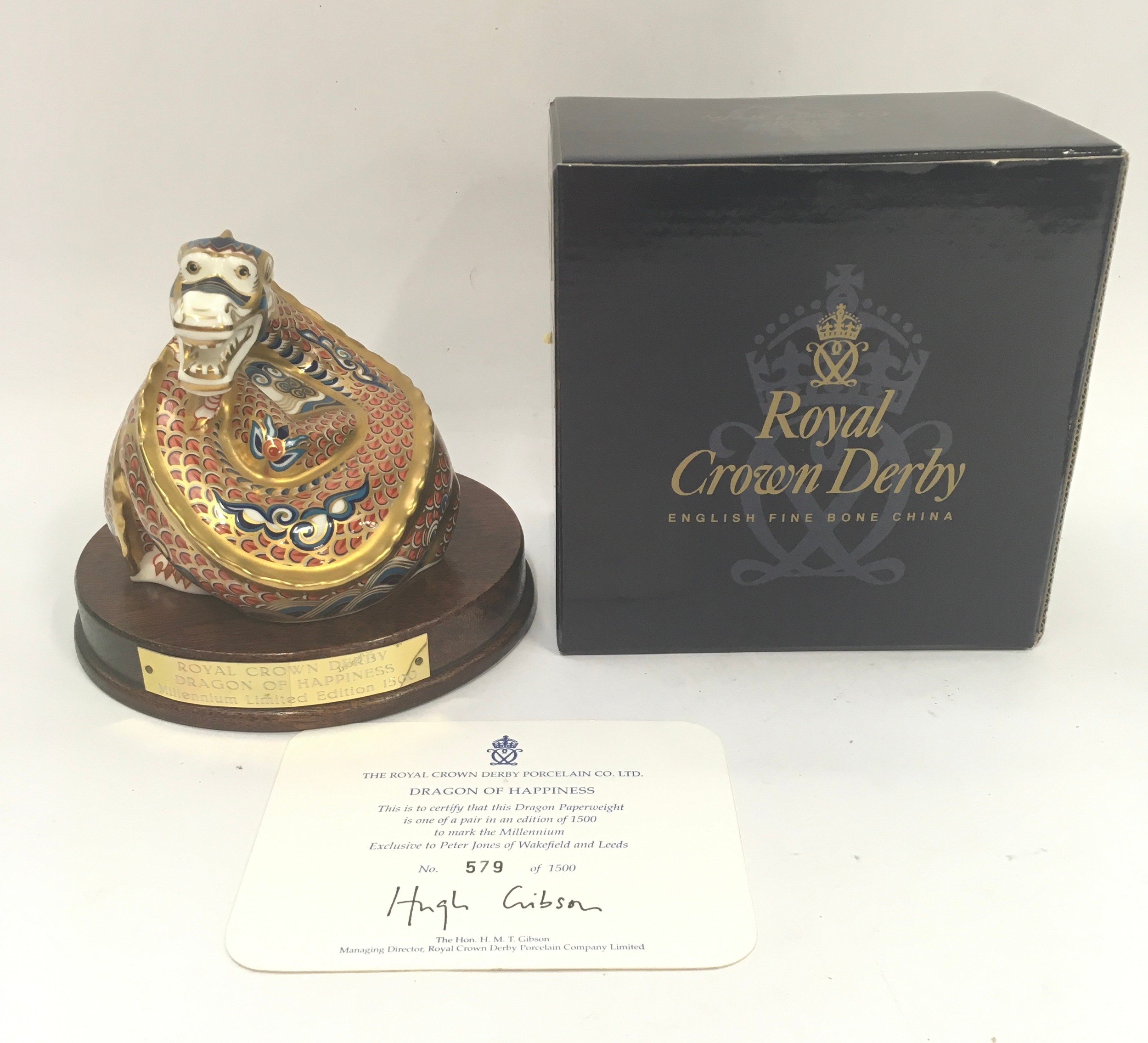 Royal Crown Derby paperweight: Dragon of Happiness, 2000, with gold stopper and base, Limited