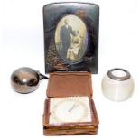 Four items including an antique copper picture frame, a heavy glass match holder with silver rim,