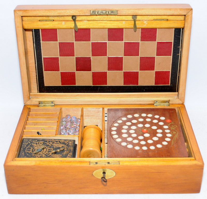 Victorian hardwood games compendium with full suite of games including chess, bezique, steeplechase,