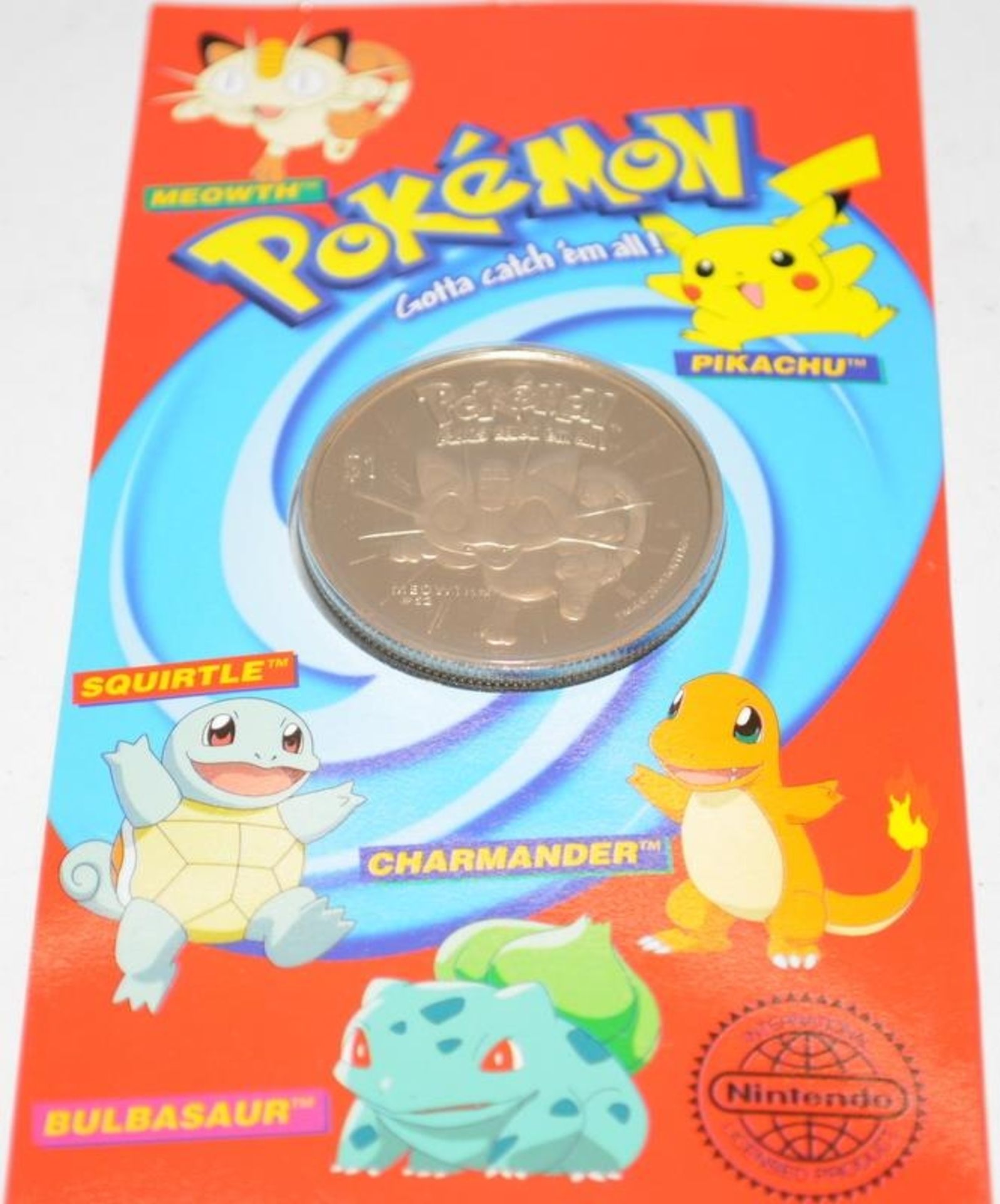 Rare Pobjoy Mint 2001 Nuie $1 Pokemon cupro nickel coin. Character Meowth, carded and sealed.