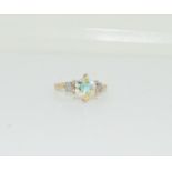 9ct gold ladies opaline Chrystal center stone diamond chip shoulder ring size M