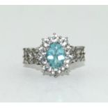 A 925 silver and aqua stone cluster ring Size O