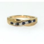 9ct gold Ladies Diamond and Sapphire twist ring H/M diamond in ring size R