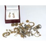 Quantity of earrings to include gold and silver