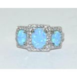 new W/G on silver opal trilogy ring Size O