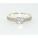 925 silver square set solitaire ring. Size T.