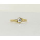 18ct Gold Diamond solitaire twist ring. approx 0.33ct Size P.