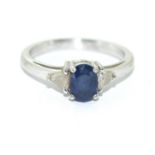 White metal Diamond and Sapphire ring. Size N.