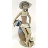 Lladro figure of a girl with a beach ball 21cm tall.