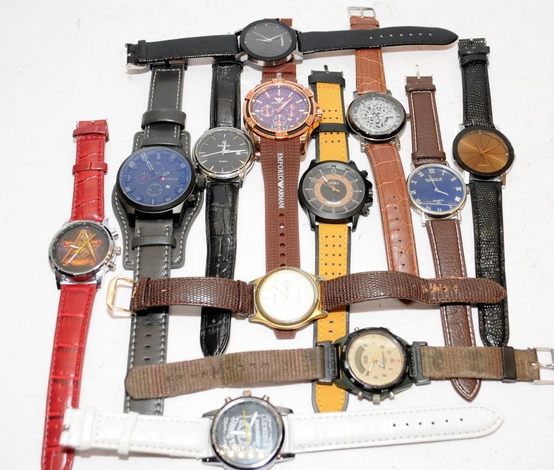 A quantity of gents quartz fashion watches, 12 in lot