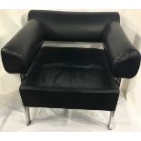 A Mid century black leather living chair with chrome legs. 29”x29”x31”.