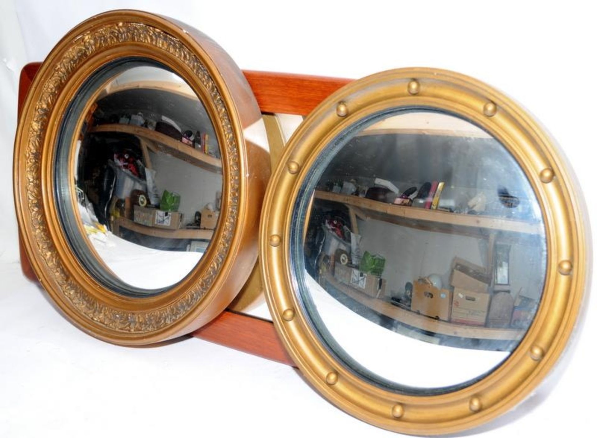 Three vintage wall mirrors to include wood and moulded plaster framed convex glass examples. Largest