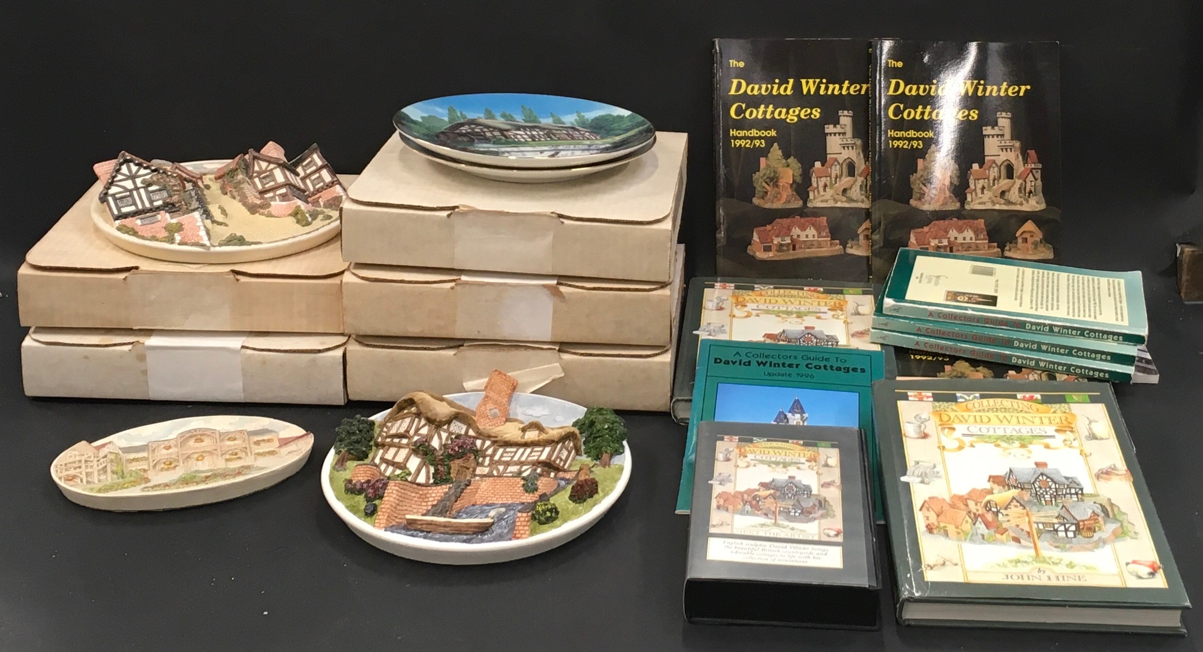 David Winter: Collection of wall plates, plaques, collectors handbooks and a VHS Tape.