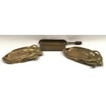 Pair of Art Nouveau brass soap dishes together with a brass crumb tray/dust pan (3).