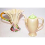 Two pieces of Clarice Cliff Newport pottery include in a 'My Garden' water jug and a green lidded