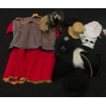Collection of fancy dress costumes and hats.