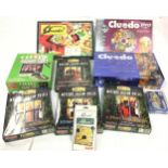 Various Cluedo games and puzzles with a couple still sealed.