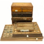 Engineers cabinet with Type case wooden drawers and a large quantity of printers Type letters