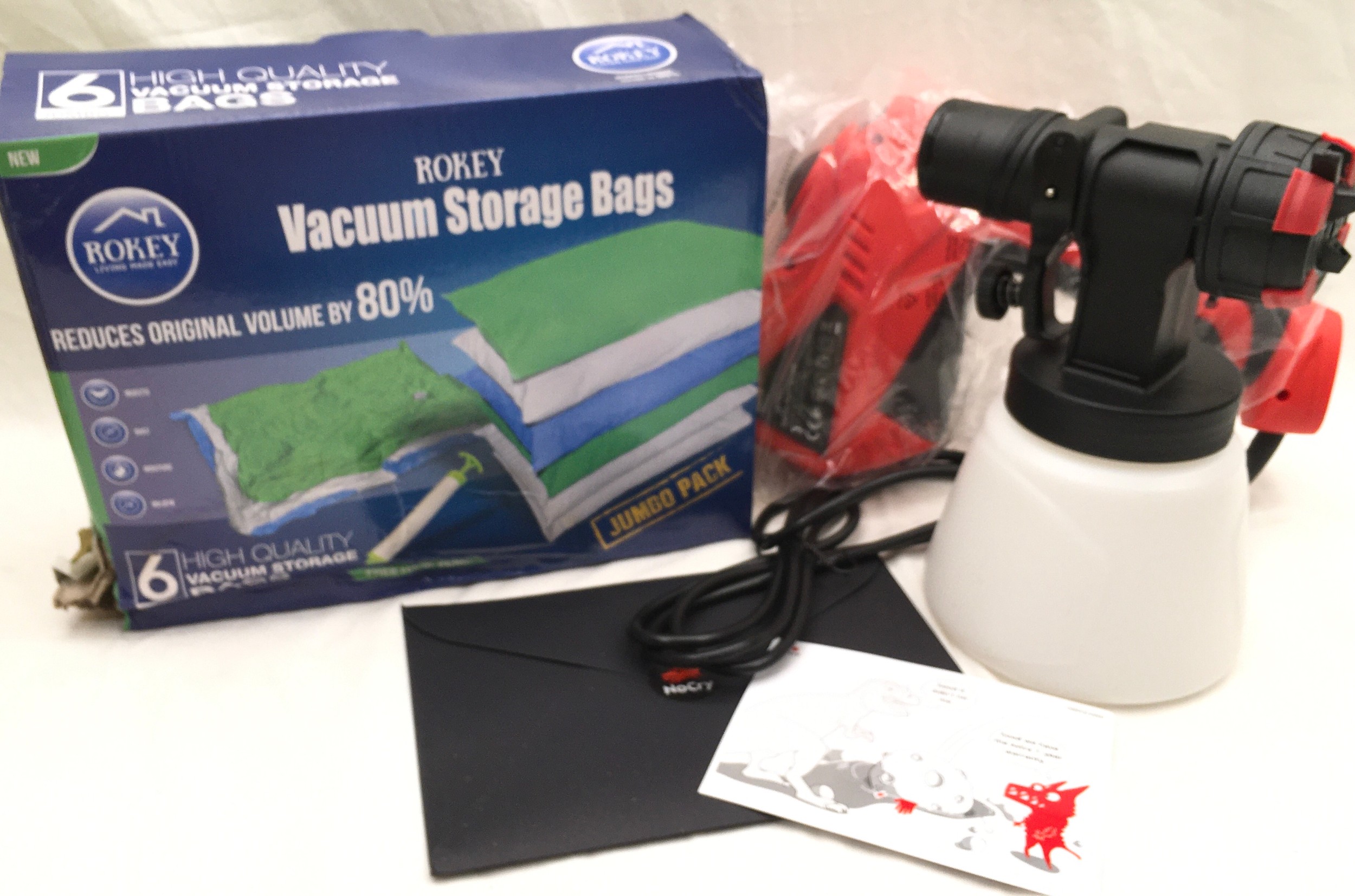 NoCry electric paint sprayer, appears unused c/w 6 x jumbo vacuum storage bags