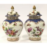 Pair of Dresden porcelain vases with covers. Hand painted with sprays of colourful flowers each