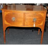 Superb example of a Georgian Mahogany Bow Front sideboard of small proportions, with drinks cellaret