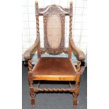 Vintage mid oak hall chair featuring barley twist supports, a rattan cane panel back and carved