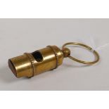 A brass RMS Titanic White Star Line reproduction ship's whistle, 4" long
