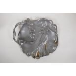 A W.M.F. Art Nouveau pewter tray, formed as a maiden and trailing flowers, 13" x 11"