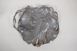 A W.M.F. Art Nouveau pewter tray, formed as a maiden and trailing flowers, 13" x 11"