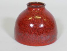 A Chinese ceramic pot with streaked red glaze, blue seal mark to base, 4½" high