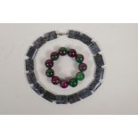 A red and green bi colour hardstone beaded bracelet, and a faceted grey hardstone necklace, 18" long