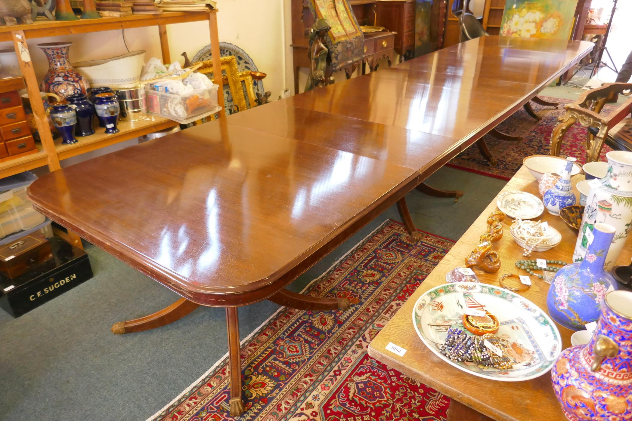 A Regency style mahogany four pedestal dining table with three extra leaves, the solid top with - Image 2 of 9