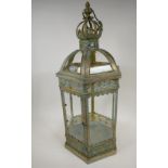 A metal and glass garden lantern, 24" high