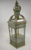 A metal and glass garden lantern, 24" high