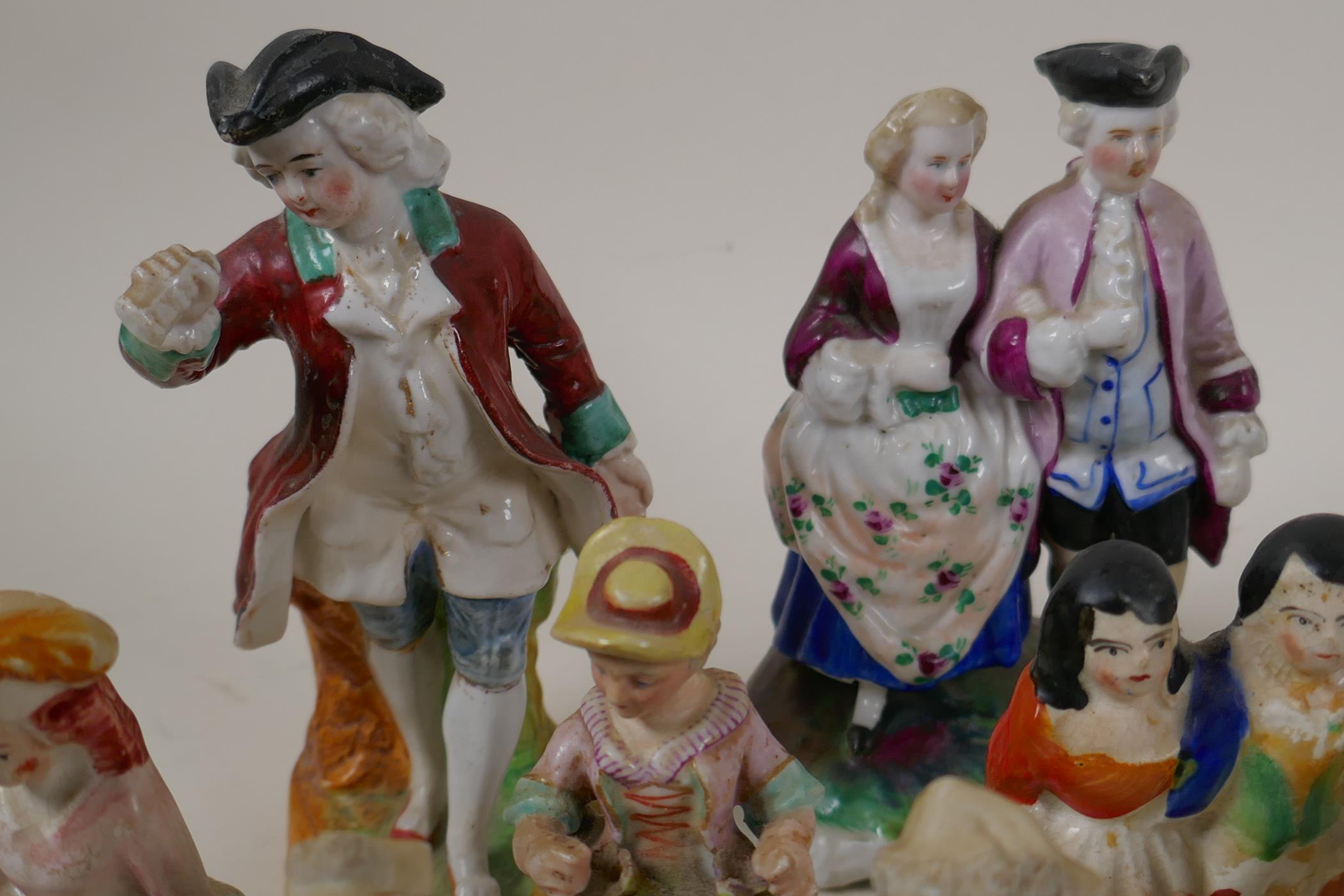 Eleven C19th continental porcelain figurines including groups and a fairing, largest 5½" - Image 4 of 6