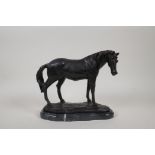 A bronze figure of a horse, on a marble base, 8½" high, 10" long