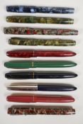 A collection of seven Blackbird Mabie Todd Self-Filler fountain pens, two Swan Mabie Todd Jackdaw