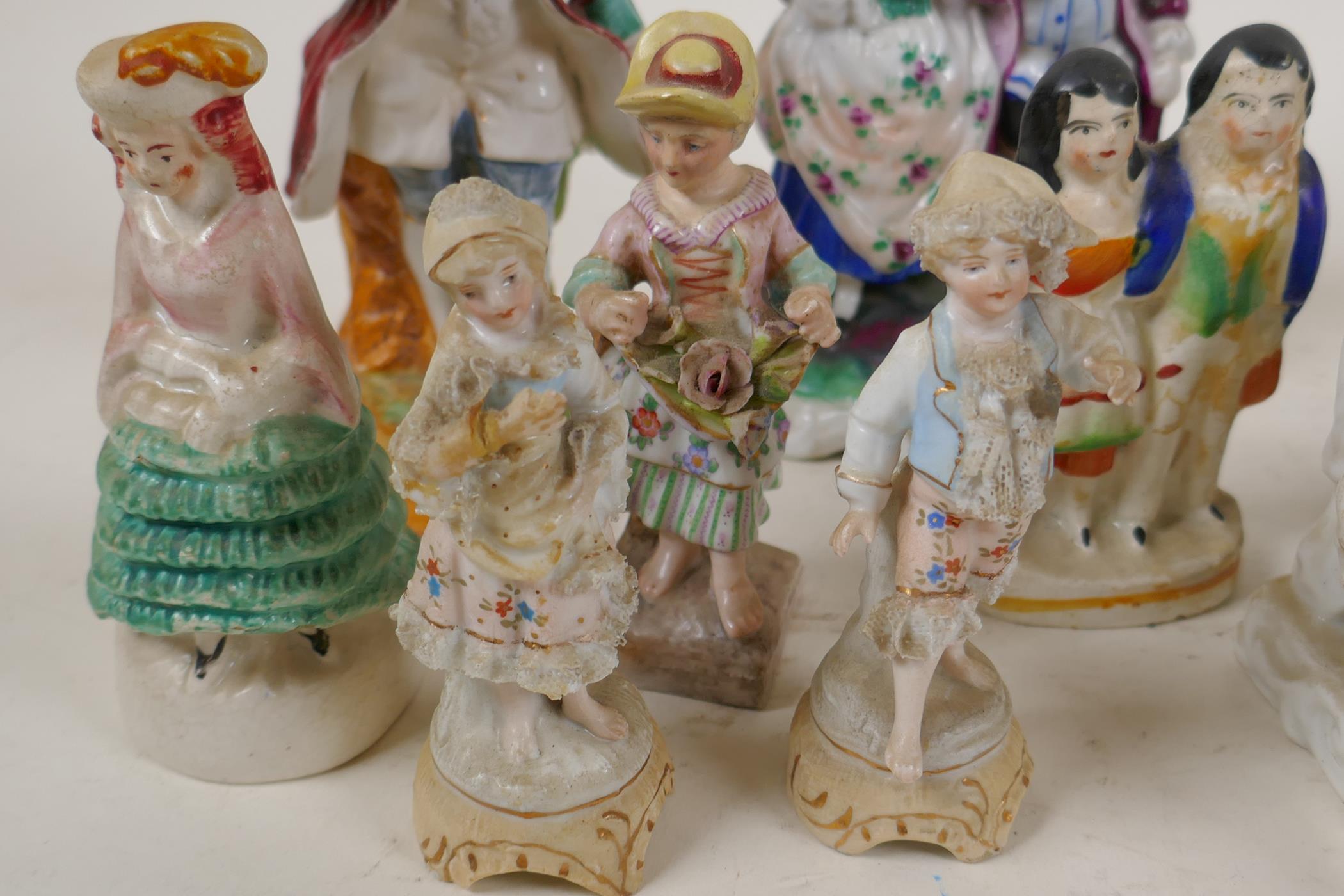 Eleven C19th continental porcelain figurines including groups and a fairing, largest 5½" - Image 3 of 6