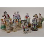 Eleven C19th continental porcelain figurines including groups and a fairing, largest 5½"