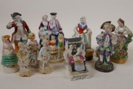 Eleven C19th continental porcelain figurines including groups and a fairing, largest 5½"