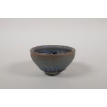 A Chinese Jian Kiln bowl with an iridescent glaze, 3½" diameter