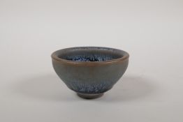 A Chinese Jian Kiln bowl with an iridescent glaze, 3½" diameter