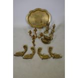 A pair of C19th brass fire dogs, a three branch wall sconce, tray etc and a set of four C19th bronze